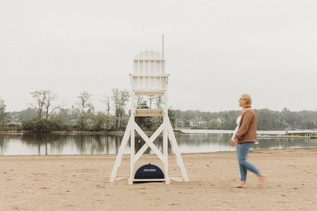 Creative entrepreneur walking on the beach, taking time to recharge – Indianapolis brand photographer lifestyle moment
