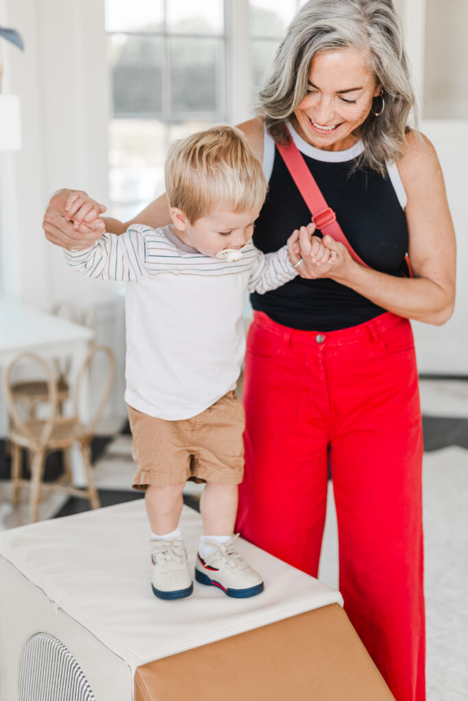 Grandmother and child enjoying new child's play area in Zionsville, IN