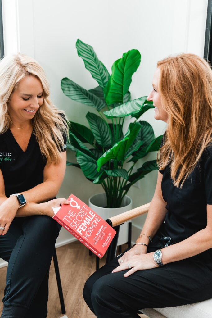Wellness practitioner meeting with mock client during brand session